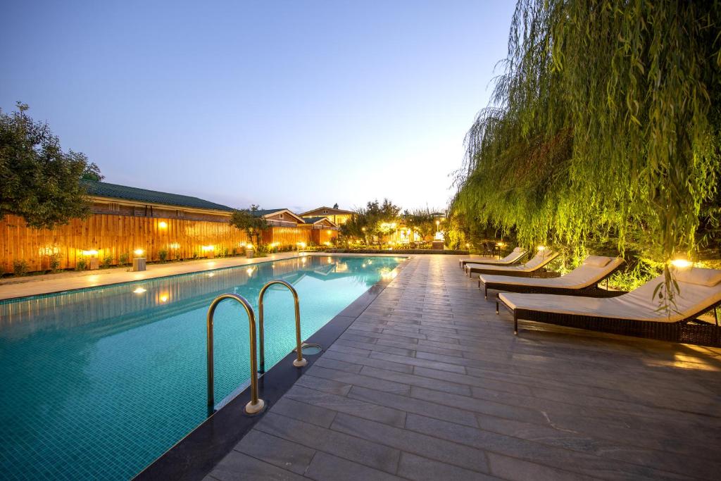 Bazén v ubytování The Orchard Retreat & Spa nebo v jeho okolí
