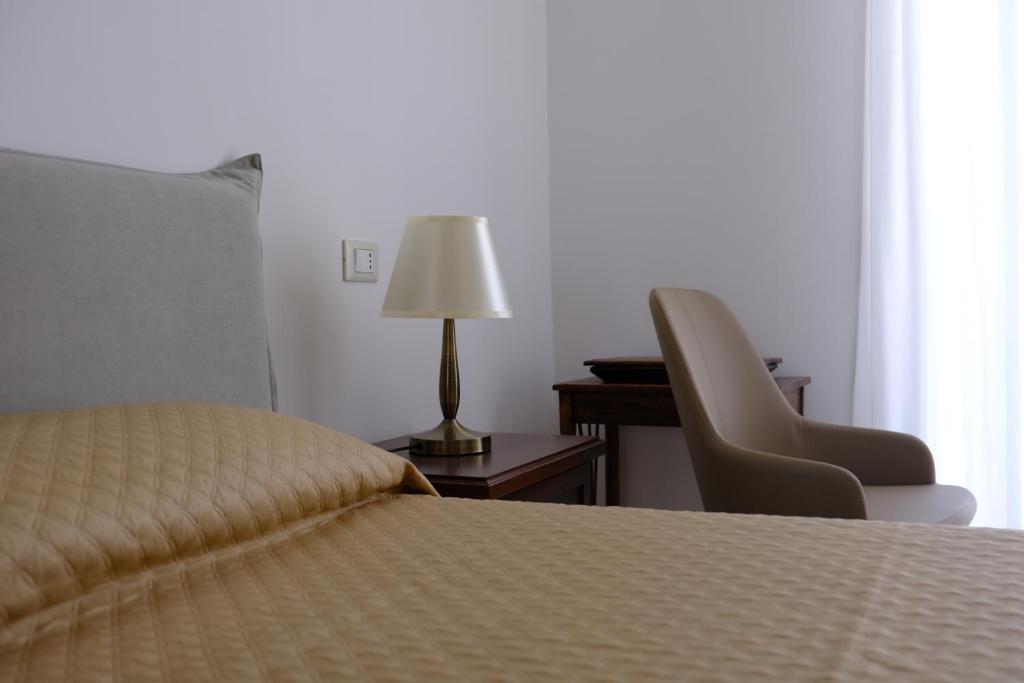 Postel nebo postele na pokoji v ubytování Al Corso Charming Rooms