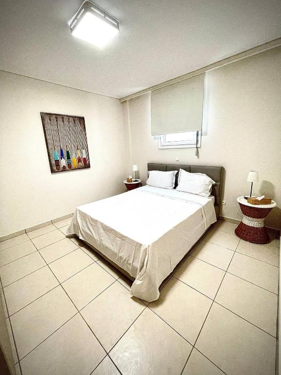 Posteľ alebo postele v izbe v ubytovaní PH Marina Apartments