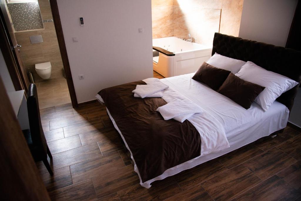 Voodi või voodid majutusasutuse Sobe i Apartmani Casa Mia toas