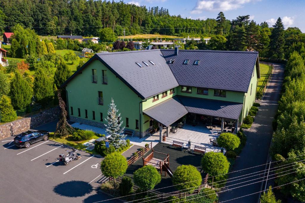 an overhead view of a large house with a parking lot at Hotel Hermes in Krnov