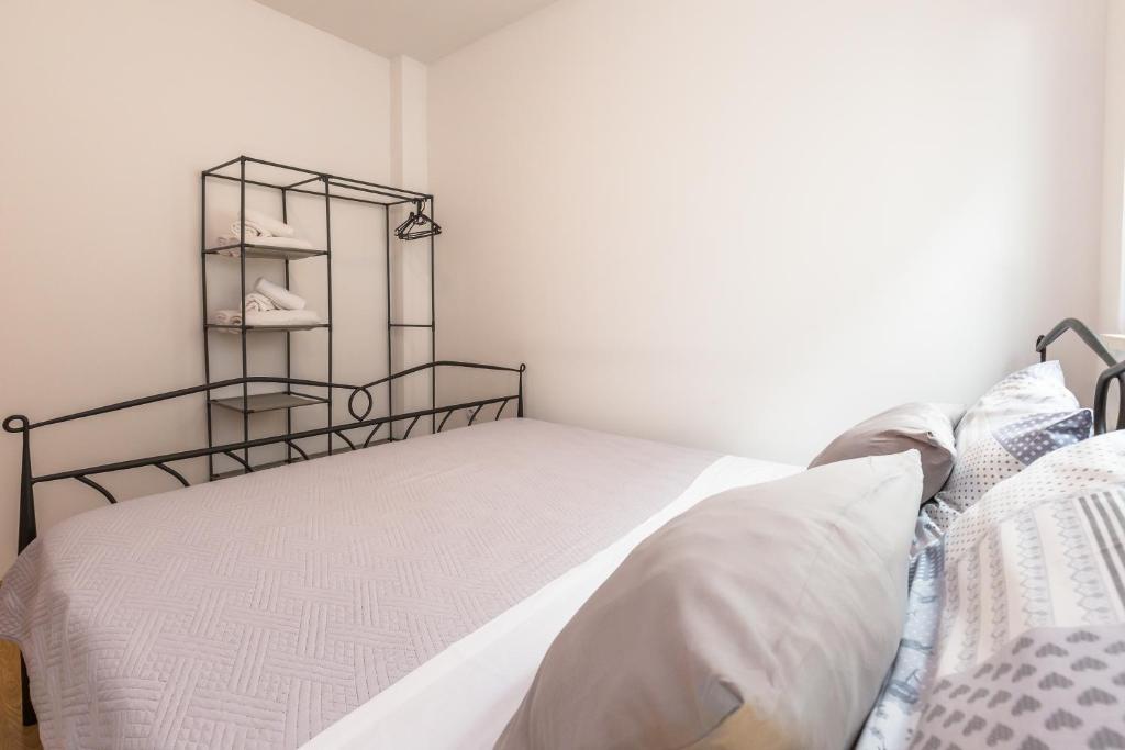 Posteľ alebo postele v izbe v ubytovaní MODERN apartment OMIS