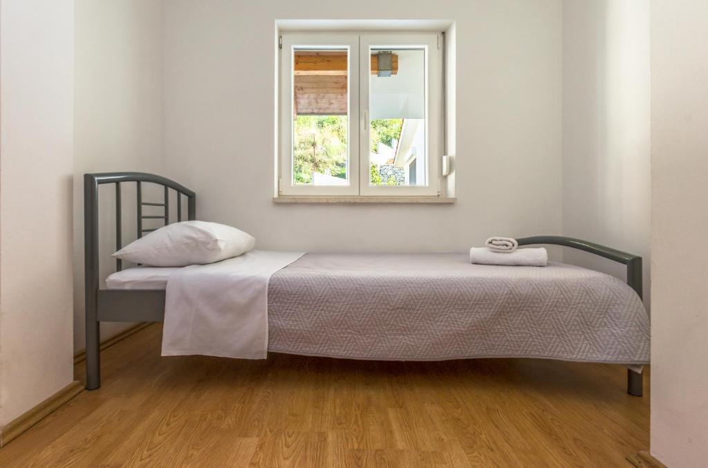 Posteľ alebo postele v izbe v ubytovaní MODERN apartment OMIS