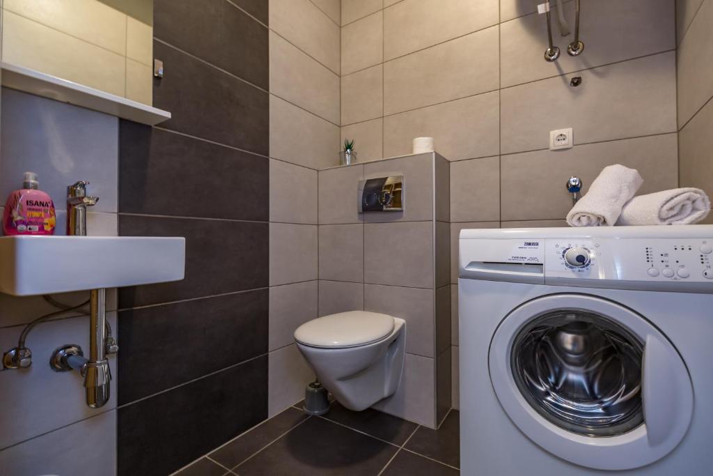 Kúpeľňa v ubytovaní MODERN apartment OMIS