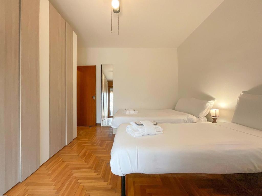 Bassanello Apartment tesisinde bir odada yatak veya yataklar