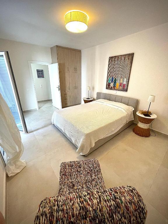 Posteľ alebo postele v izbe v ubytovaní PH Marina Apartments