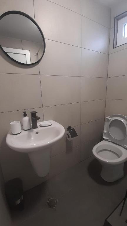 Koupelna v ubytování Mebo House
