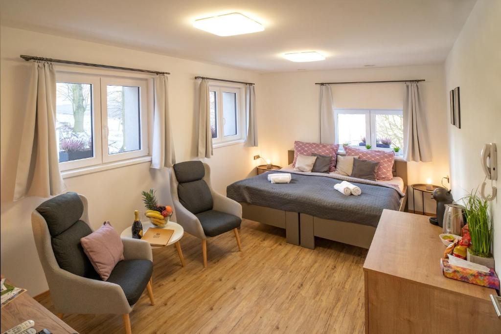 Postel nebo postele na pokoji v ubytování Hotel Smrž