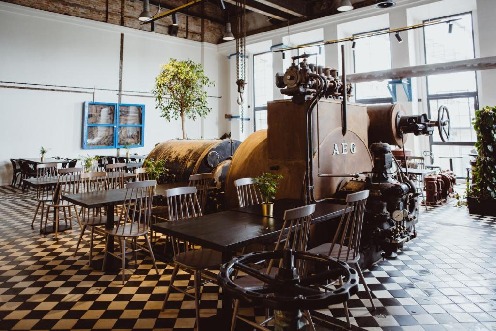 Reštaurácia alebo iné gastronomické zariadenie v ubytovaní Cukrownia Żnin