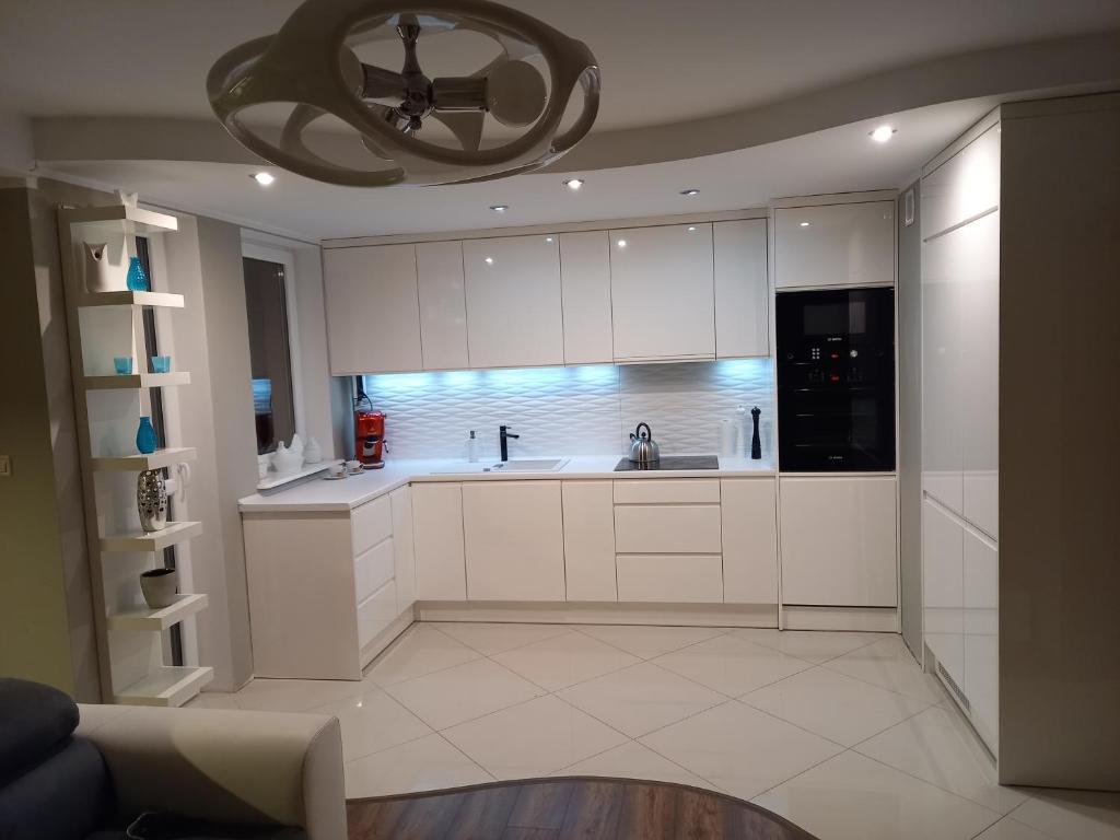 Kuchyňa alebo kuchynka v ubytovaní Apartament 35