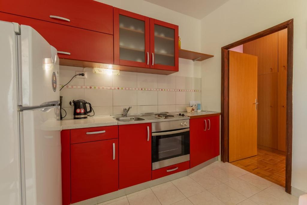 Kuchyň nebo kuchyňský kout v ubytování Apartments Zdena