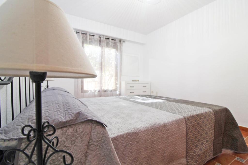 Posteľ alebo postele v izbe v ubytovaní Global Properties, El Coquetón - Bonito y tranquilo apartamento en Canet playa