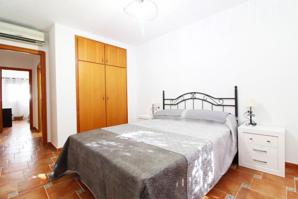 Posteľ alebo postele v izbe v ubytovaní Global Properties, El Coquetón - Bonito y tranquilo apartamento en Canet playa
