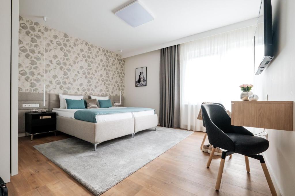 Posteľ alebo postele v izbe v ubytovaní Adele Apartments