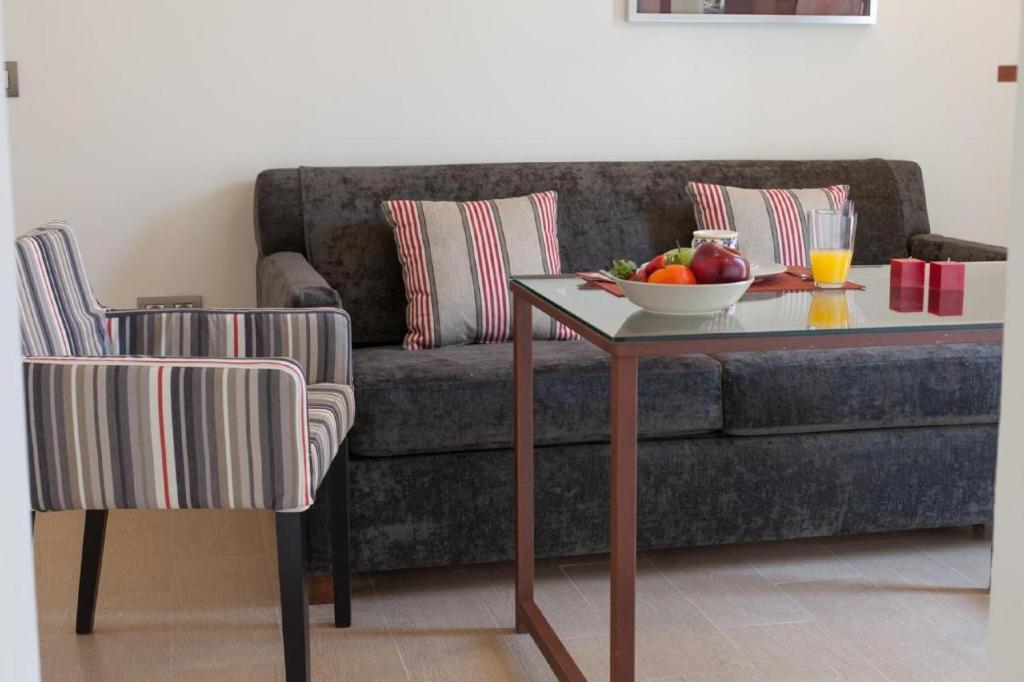Posedenie v ubytovaní Apartamento Puerta del Arenal - Kainga Homes