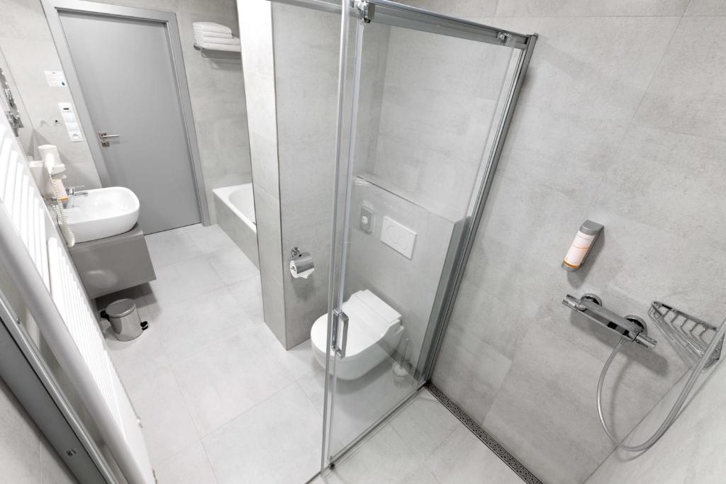 Koupelna v ubytování Ala hotel
