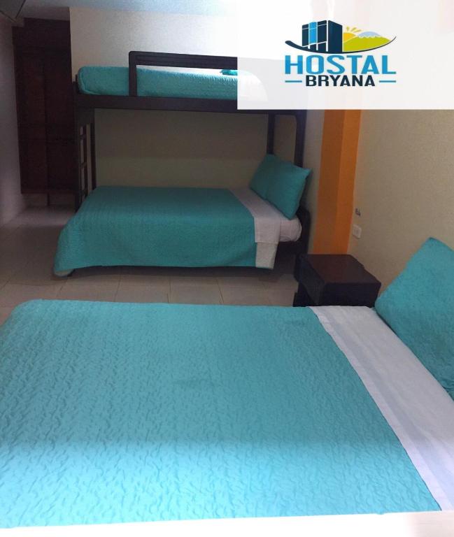 Postel nebo postele na pokoji v ubytování Hostal Bryana Inn Baños