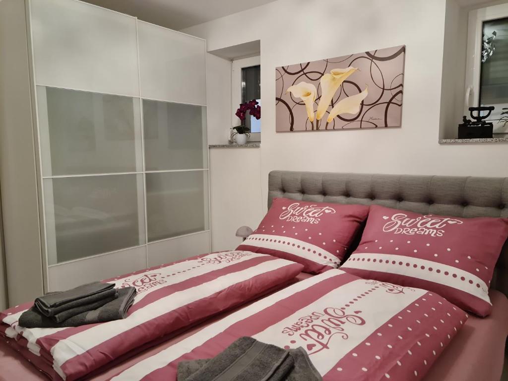 Posteľ alebo postele v izbe v ubytovaní Beutlich's Wörtherseeappartements
