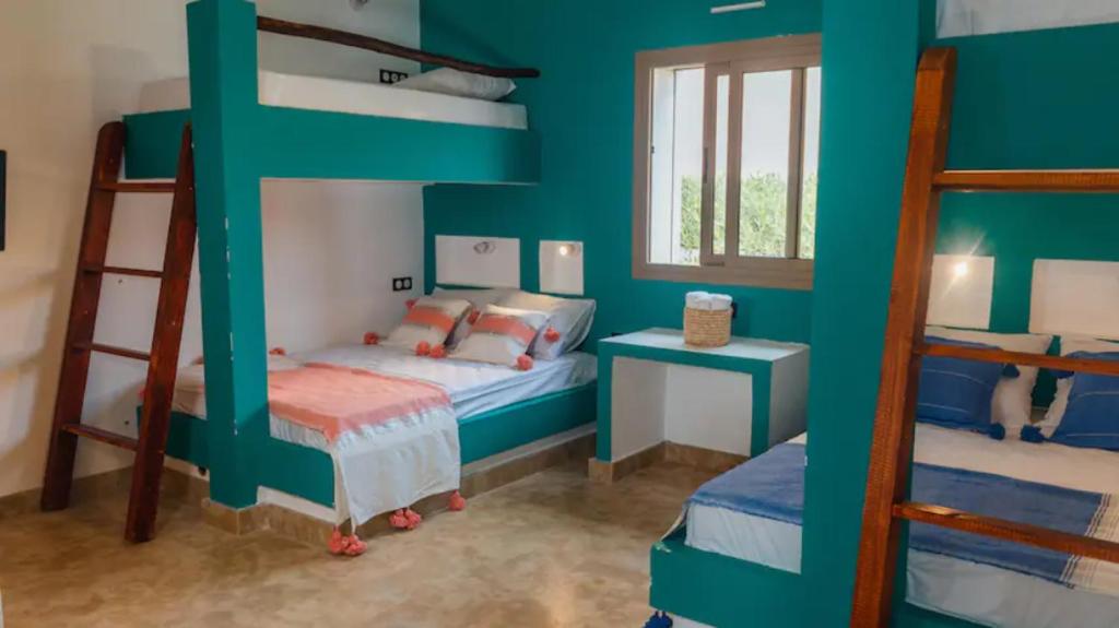 Postel nebo postele na pokoji v ubytování Villa avec piscine Asilah, terrain de foot privative