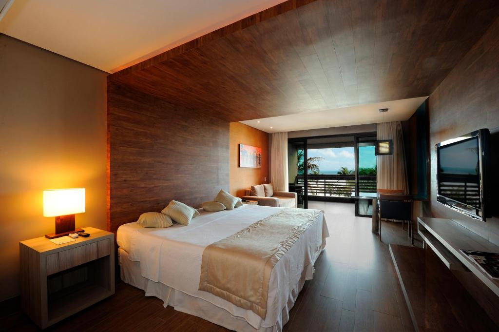 TV a/nebo společenská místnost v ubytování Carmel Charme Resort