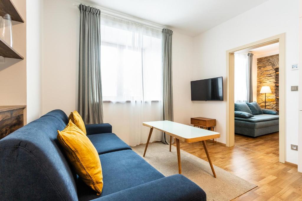 TV a/nebo společenská místnost v ubytování U Pivovaru - Apartments Boží Dar