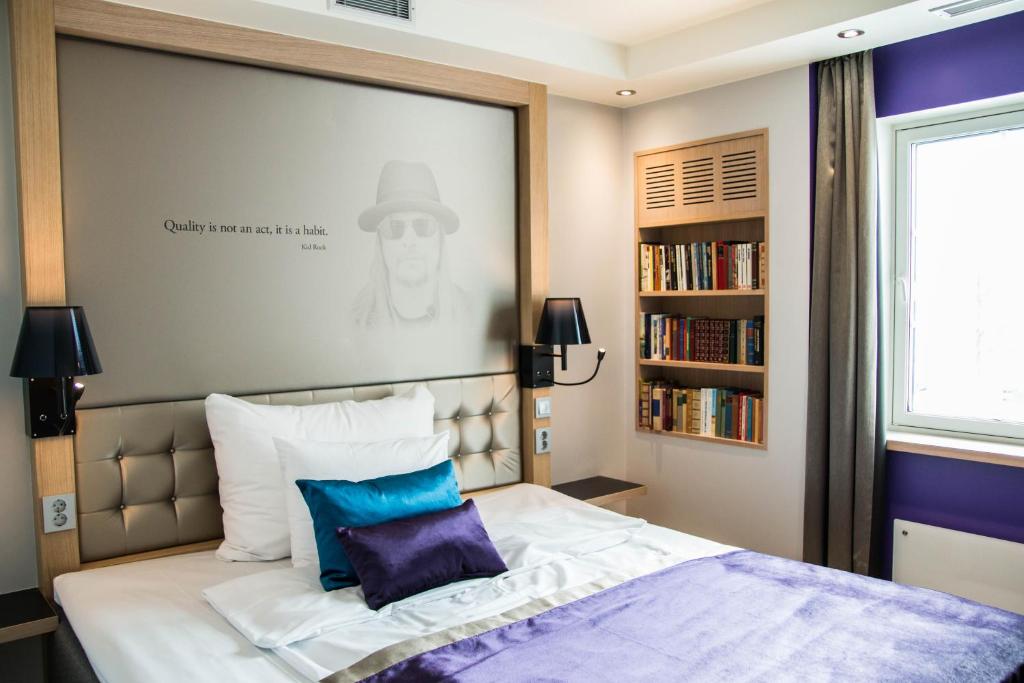 Postel nebo postele na pokoji v ubytování Quality Hotel Olavsgaard