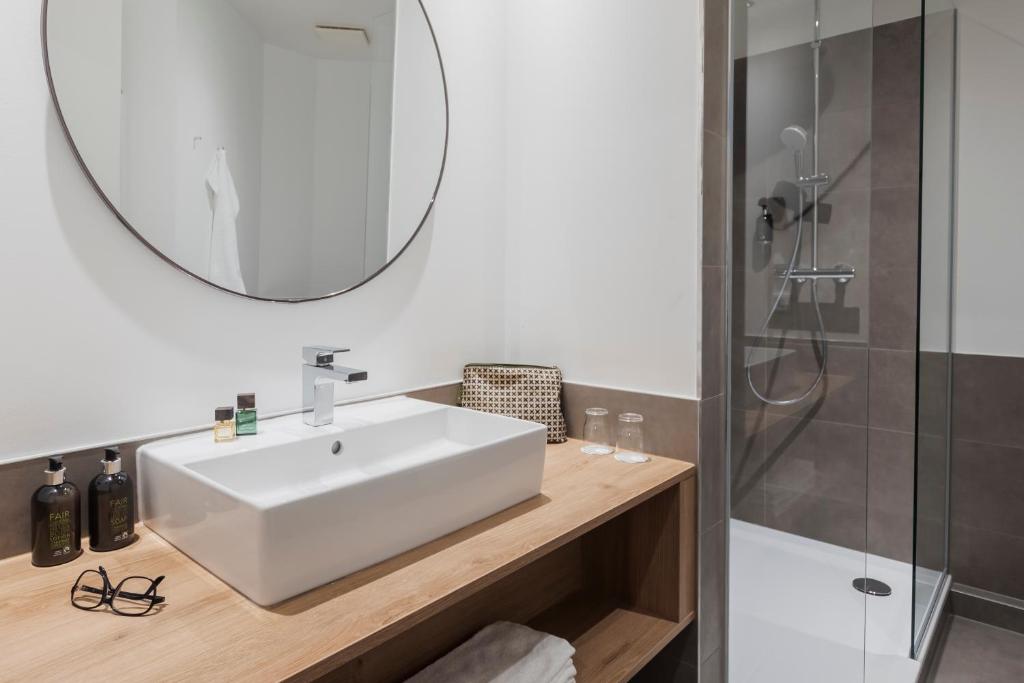 Koupelna v ubytování maakt Hotel
