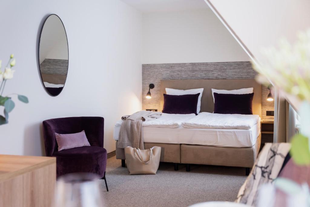 Postel nebo postele na pokoji v ubytování maakt Hotel