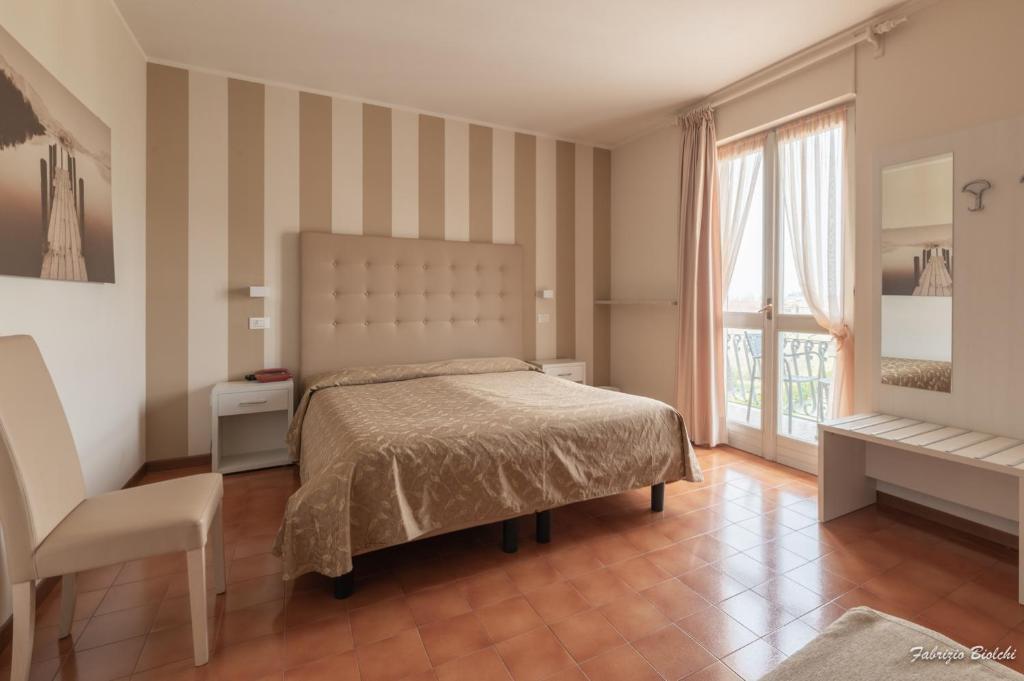 Postel nebo postele na pokoji v ubytování Albergo Bagner