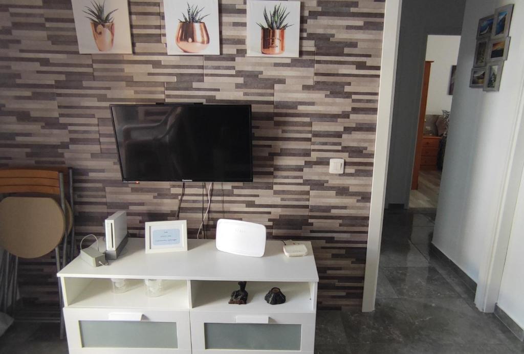 A television and/or entertainment centre at ApartaSol