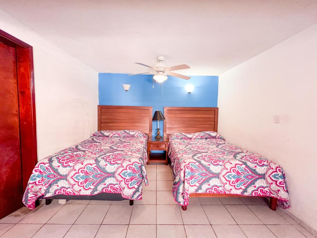 Postel nebo postele na pokoji v ubytování Loft Sabalo - Pet Friendly