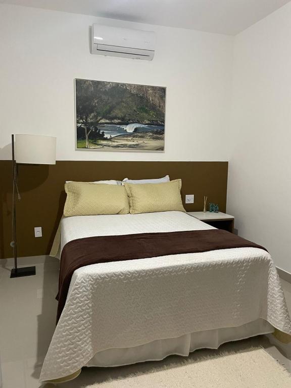 Postel nebo postele na pokoji v ubytování Pousada Reserva de Itaúna