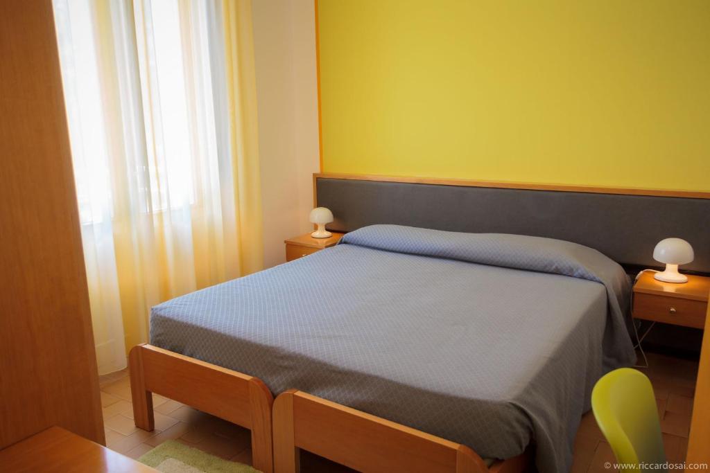 Postel nebo postele na pokoji v ubytování Hotel Bermuda
