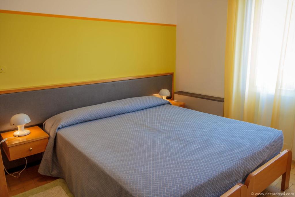 Postel nebo postele na pokoji v ubytování Hotel Bermuda