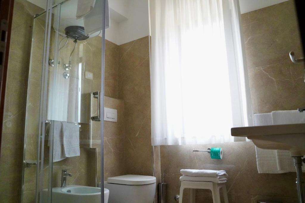 Kúpeľňa v ubytovaní Hotel Roscianum Welness SPA