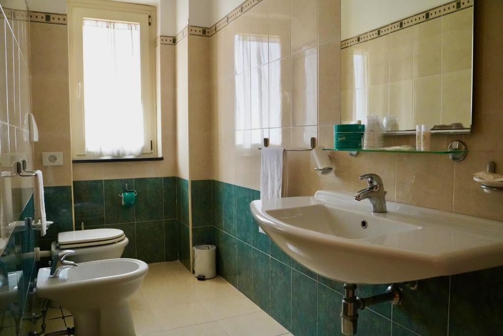 Kúpeľňa v ubytovaní Hotel Roscianum Welness SPA