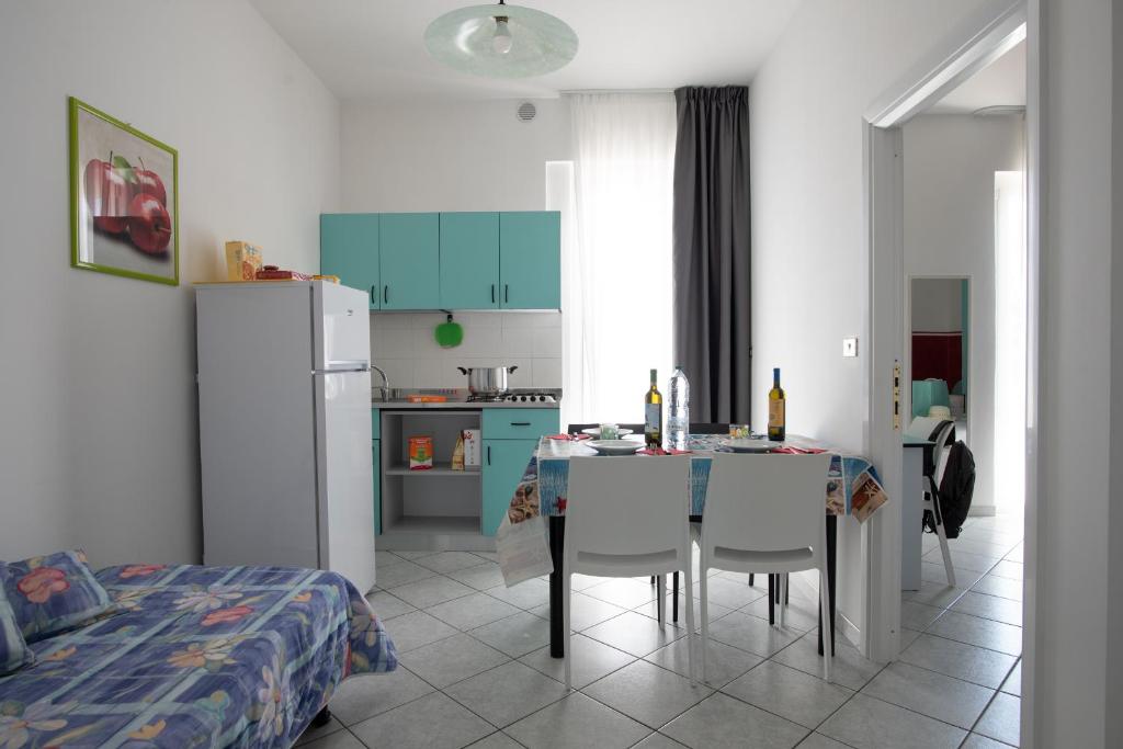 Kuchyň nebo kuchyňský kout v ubytování Camping Villaggio Calypso