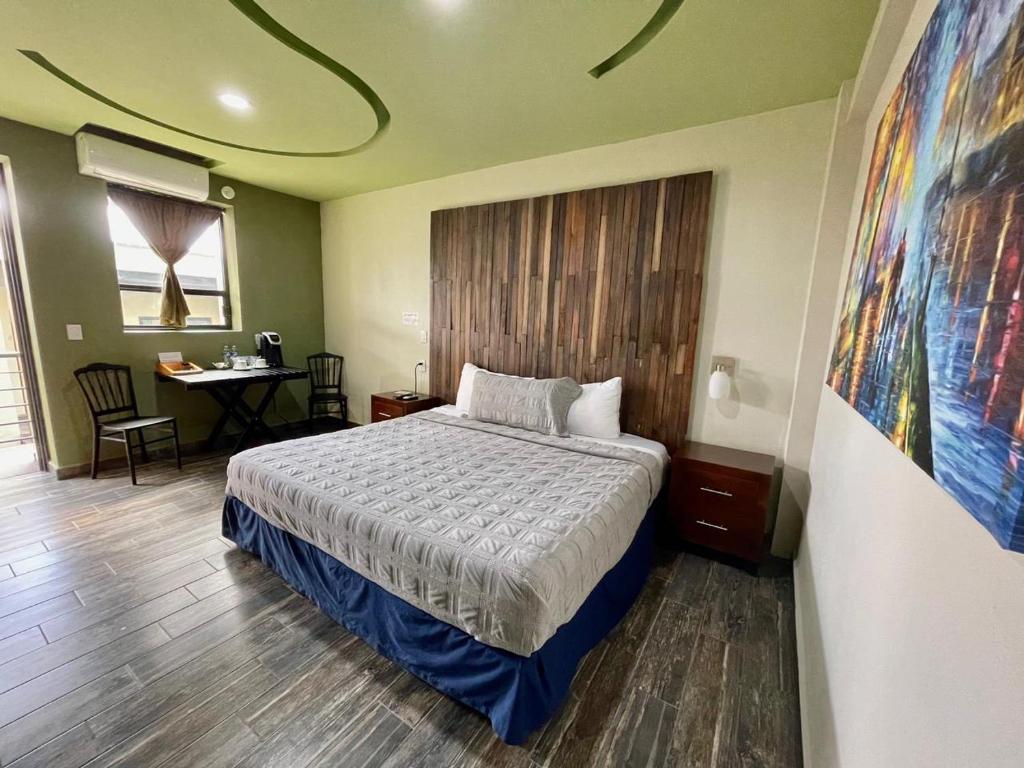 Postel nebo postele na pokoji v ubytování Independencia Dos 7 Hotel Boutique