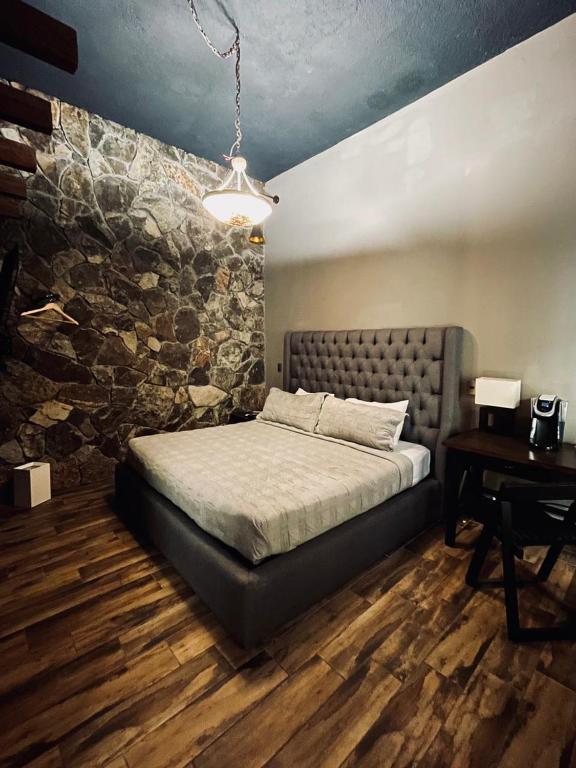 Postel nebo postele na pokoji v ubytování Independencia Dos 7 Hotel Boutique