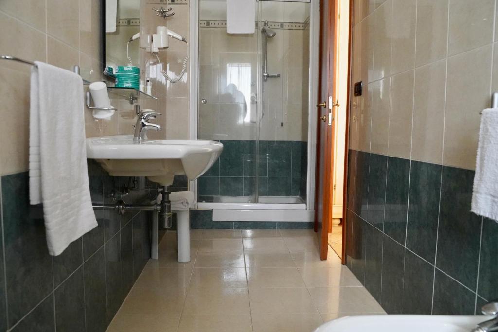 Kúpeľňa v ubytovaní Hotel Roscianum Welness SPA