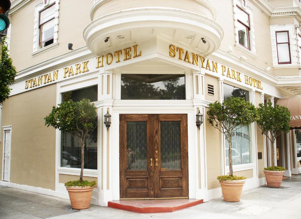 
a large white building with a clock on the front of it at Stanyan Park Hotel in San Francisco
