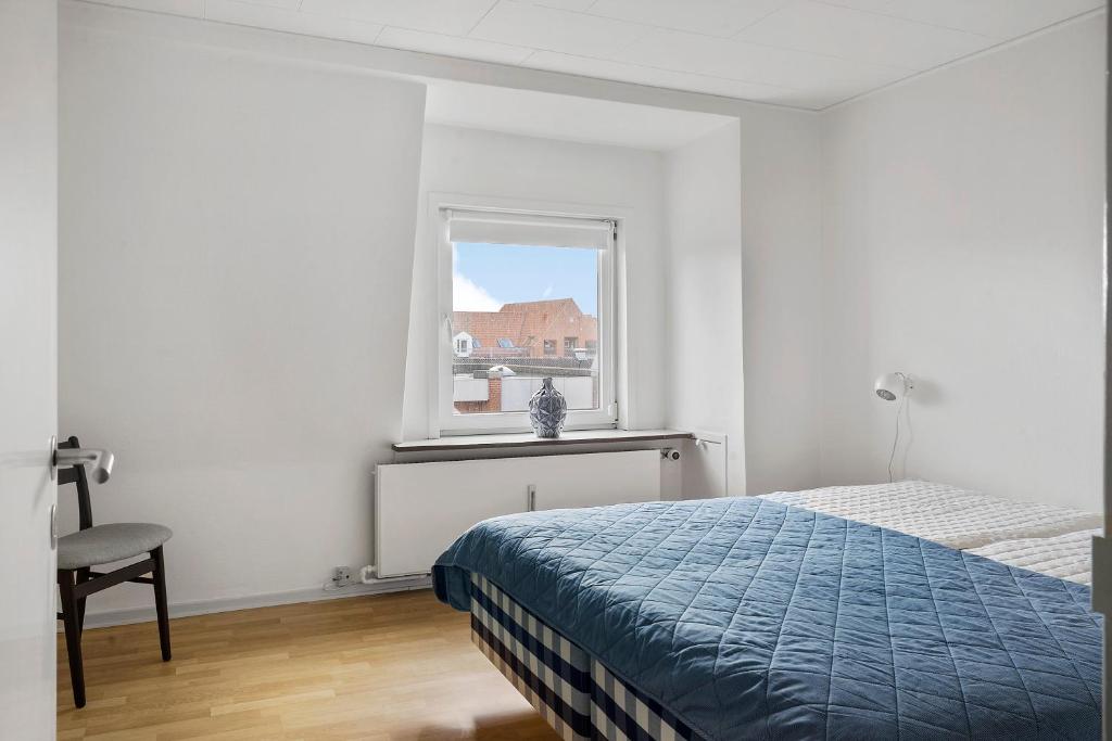 Postel nebo postele na pokoji v ubytování Ulfborg Sky Apartment