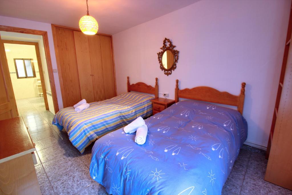 Postel nebo postele na pokoji v ubytování Casa Rural El Hidalgo Valdecolmenas de Arriba