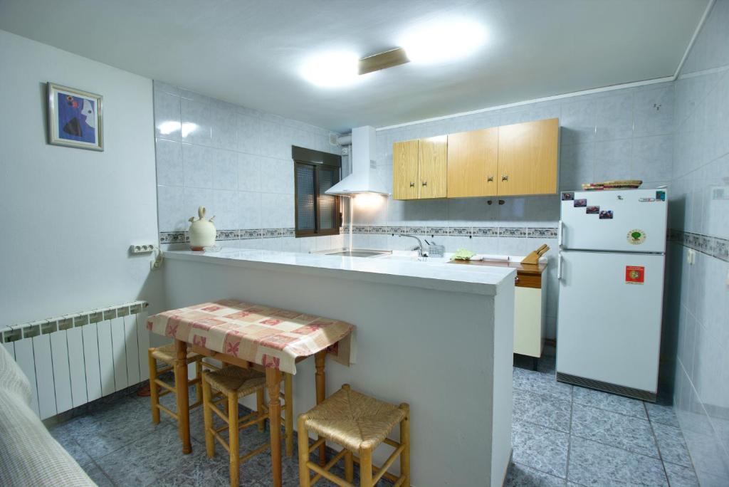 Kuchyň nebo kuchyňský kout v ubytování Casa Rural El Hidalgo Valdecolmenas de Arriba