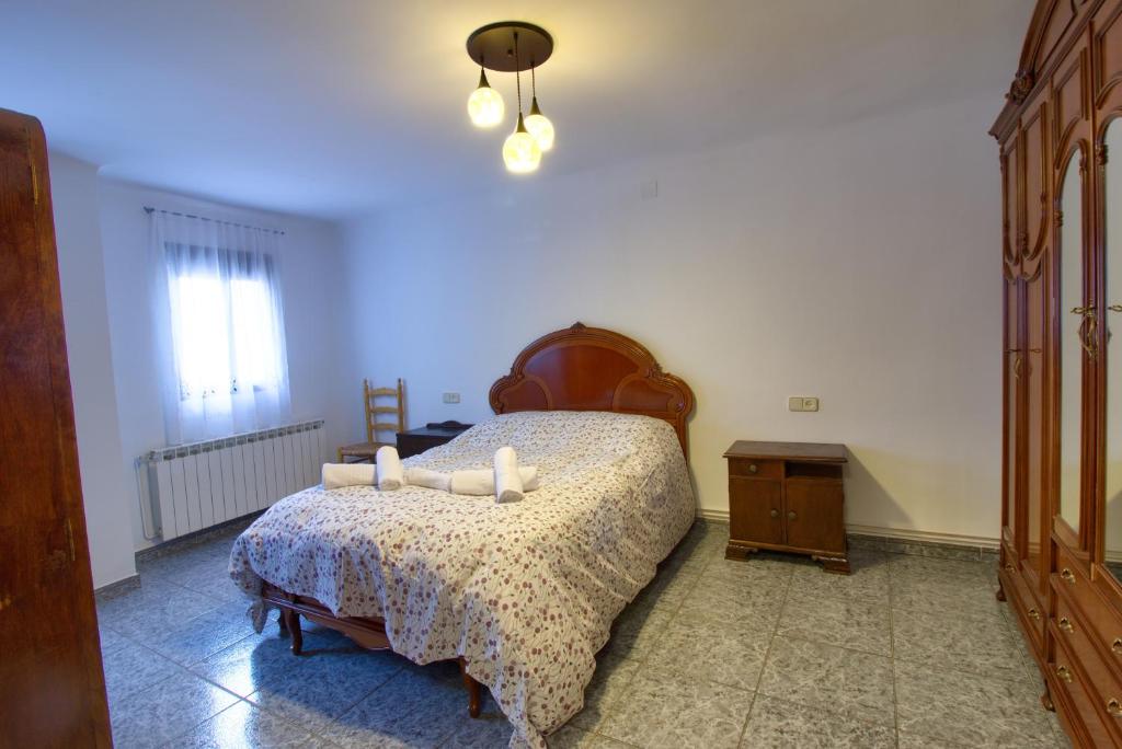 Postel nebo postele na pokoji v ubytování Casa Rural El Hidalgo Valdecolmenas de Arriba