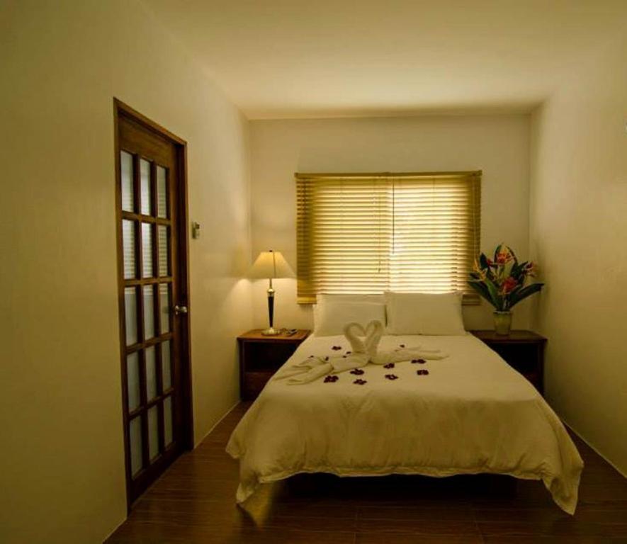 Postel nebo postele na pokoji v ubytování Discover Boracay Hotel