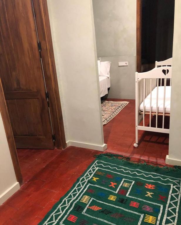 Postel nebo postele na pokoji v ubytování Hostal de Bianya