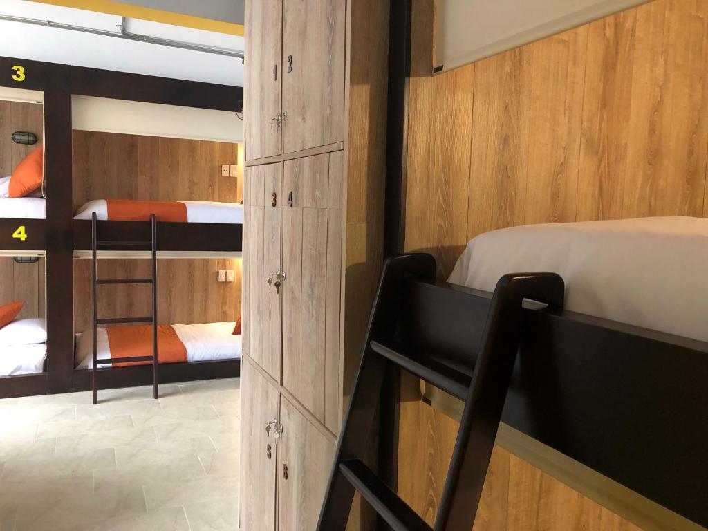Postel nebo postele na pokoji v ubytování Hotel Juliette Bogota