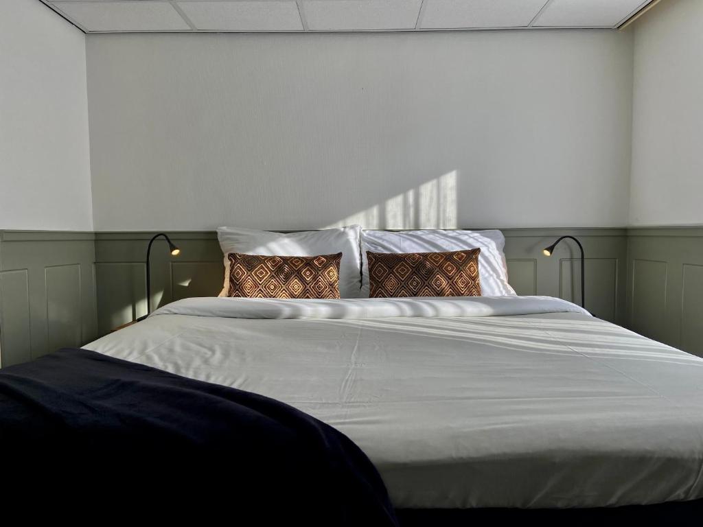 Postel nebo postele na pokoji v ubytování Hotel Beatrix