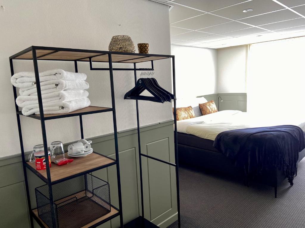 Postel nebo postele na pokoji v ubytování Hotel Beatrix